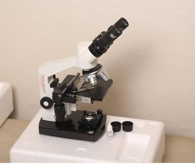 Binocular Electric Microscope